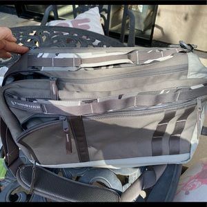 Timbuk2 light gray crossbody and backpack